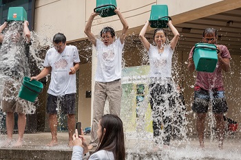 QBI researchers taking the Ice Bucket Challenge in 2014.